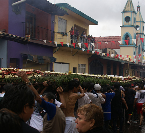 Photo: Arch being carried through the streets of Coatepec