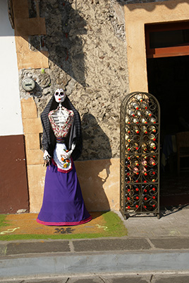 Photo: Catrina next to wine rack