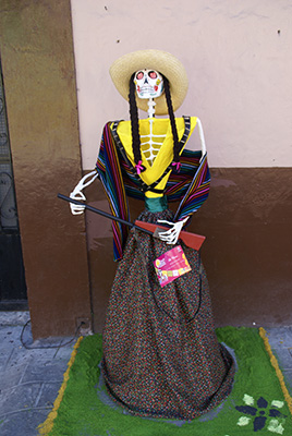 Photo: Catrina holding a rifle