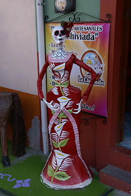 Photo: Catrina wearing red dress with white flowers
