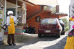 Photo: Catrín baker in driveway with bread