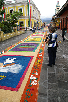Photo: Mom and me looking at the sawdust carpet