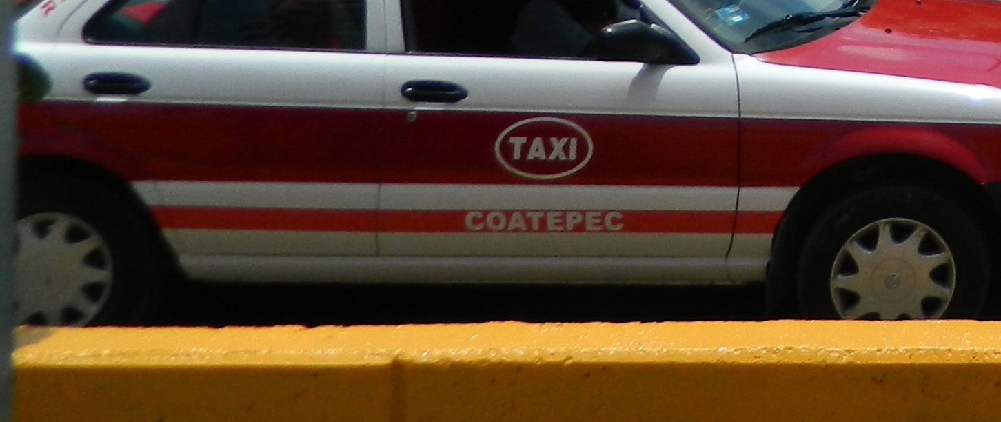 Photo: Side of a Coatepec taxi