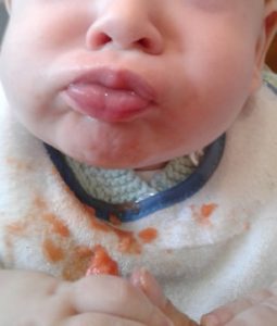 Victor eating papaya