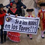 Photo of Children holding banner